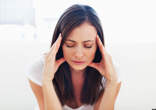 CWGFP4 Portrait of stressed woman having head pain